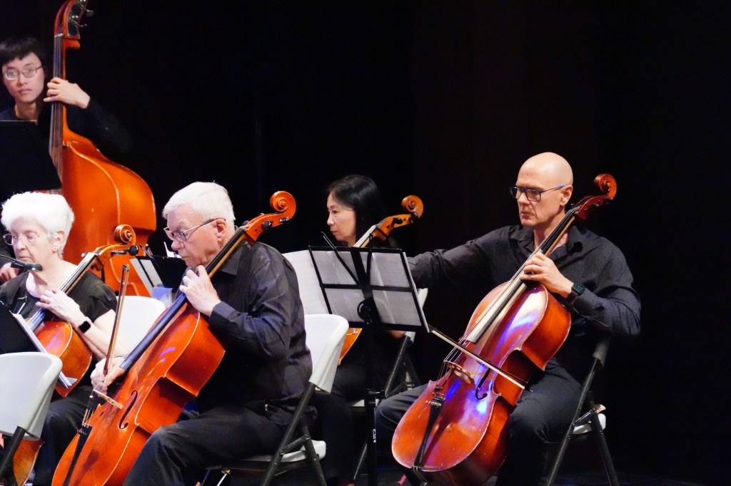 Cellists of Strings Attached Orchestra performing at the 2023 Season Finale Concert