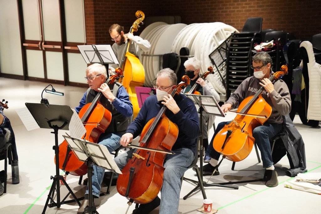 The cello section rehearsing