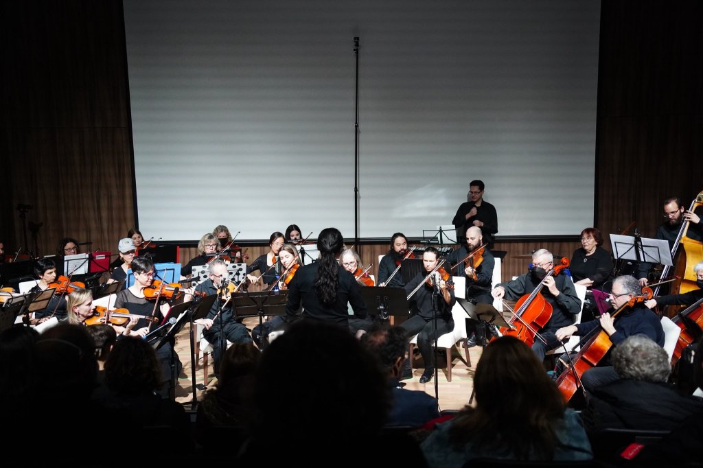 The orchestra on stage at the end of the 2022 Holiday Concert