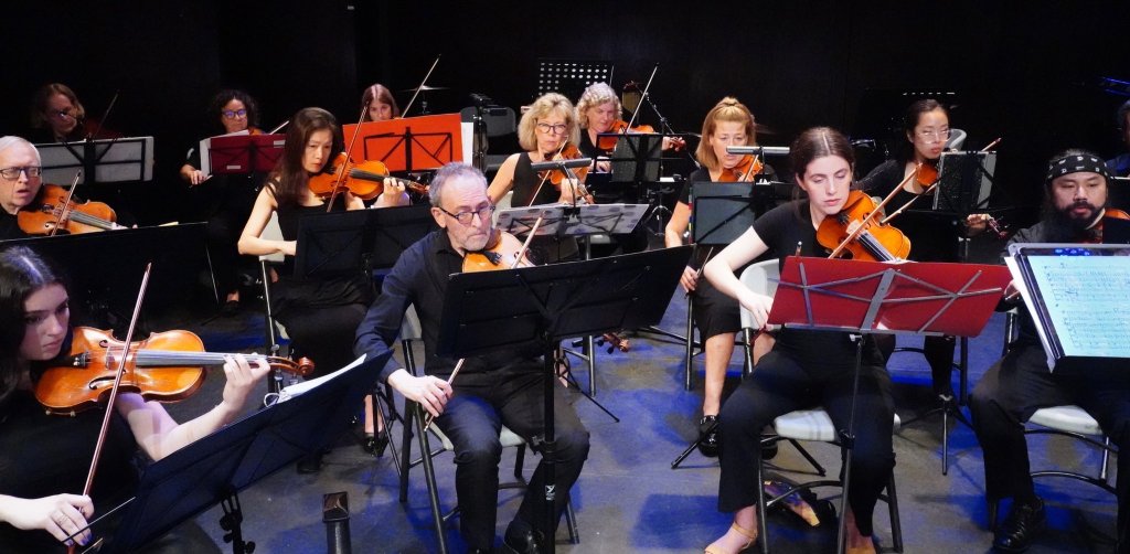 Violinists performing at the 2023 Season Finale