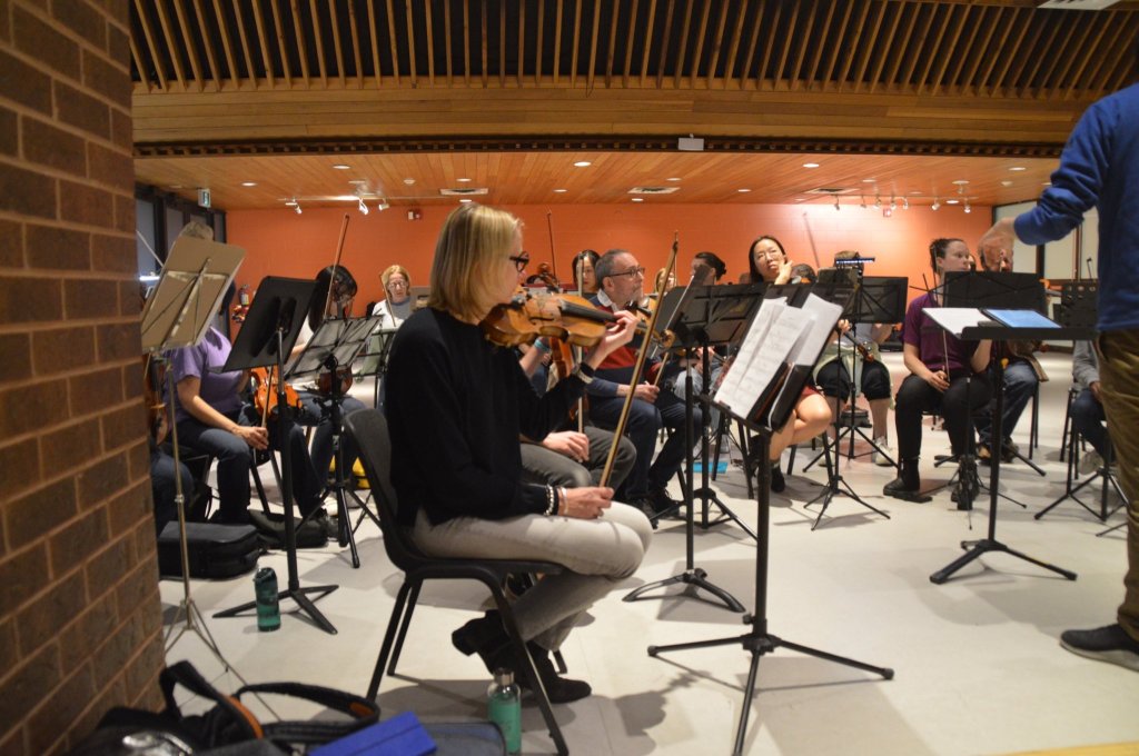 Musicians rehearsing in the orchestra’s rehearsal hall