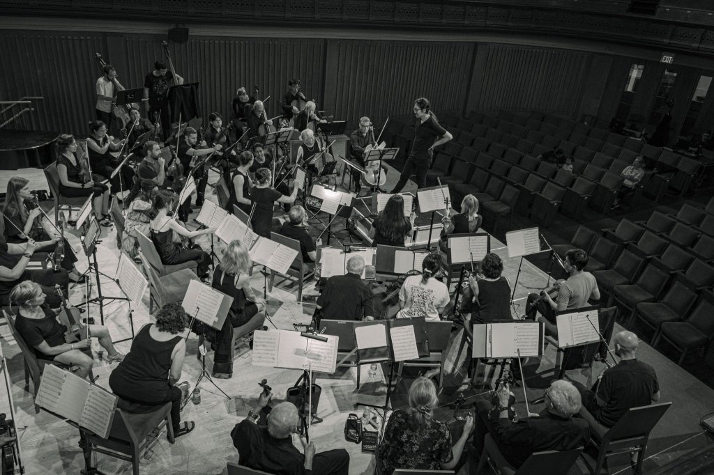 Black-and-white view of the orchestra from above