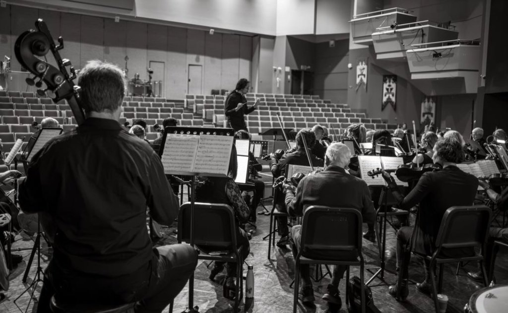 Black-and-white view of the orchestra at the 2024 Holiday Concert