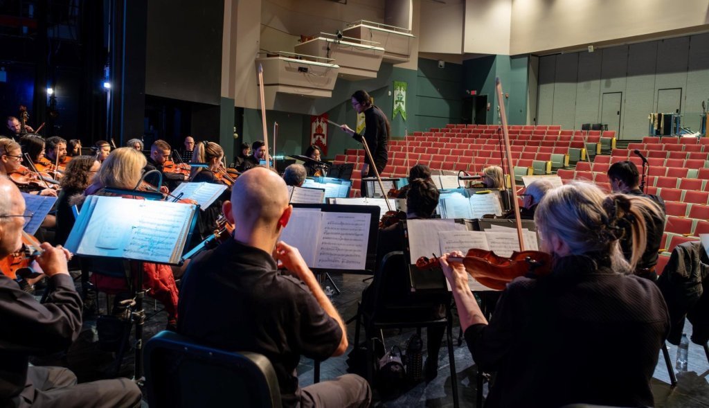 Musicians on stage before the 2024 Holiday Concert