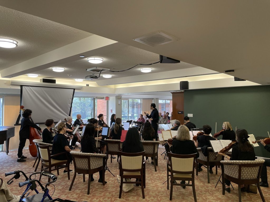 The orchestra performing for residents at Chartwell Gibson