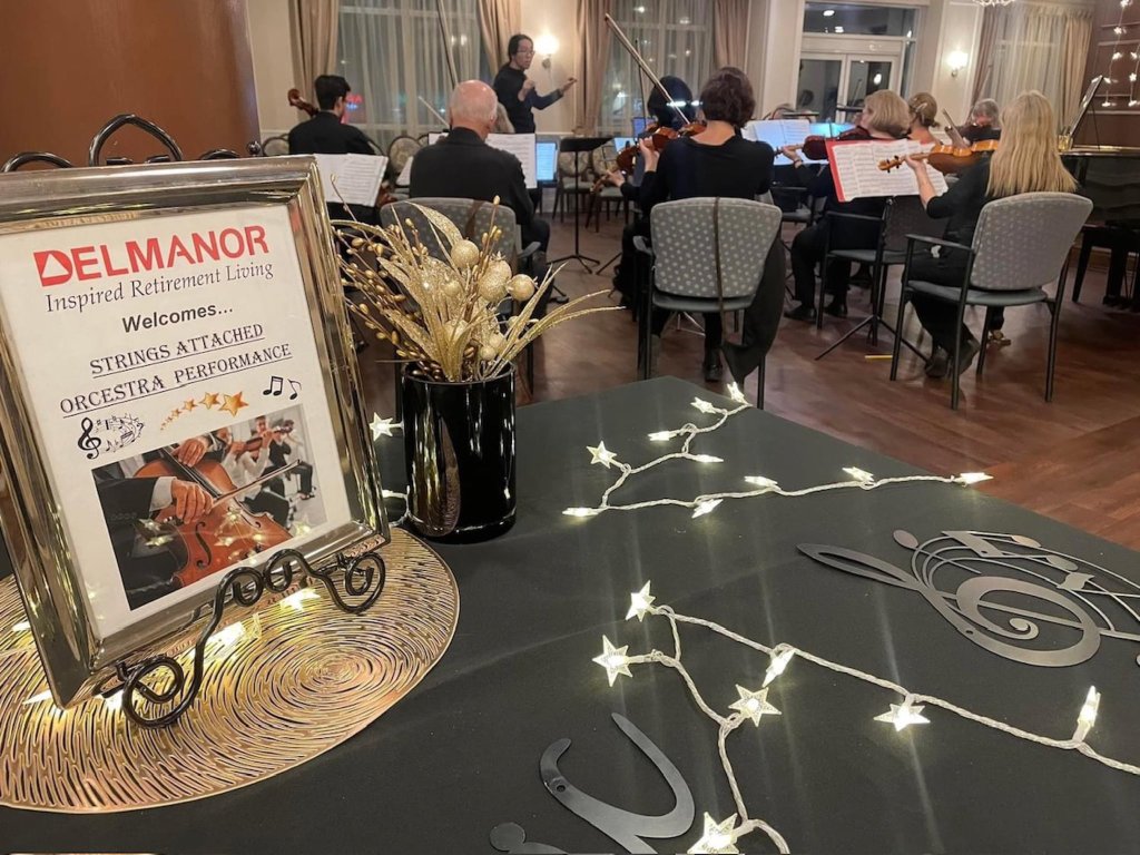 The welcome sign for the orchestra in the lobby at Delmanor Northtown
