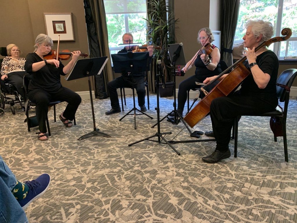 The string quartet performing in the lounge at Amica Thornhill