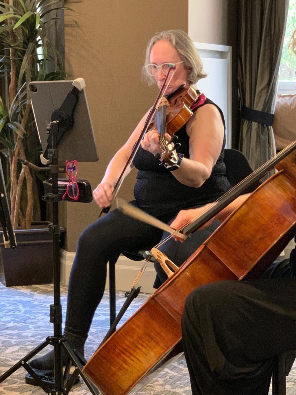 The quartet’s cellist performing at Amica Thornhill