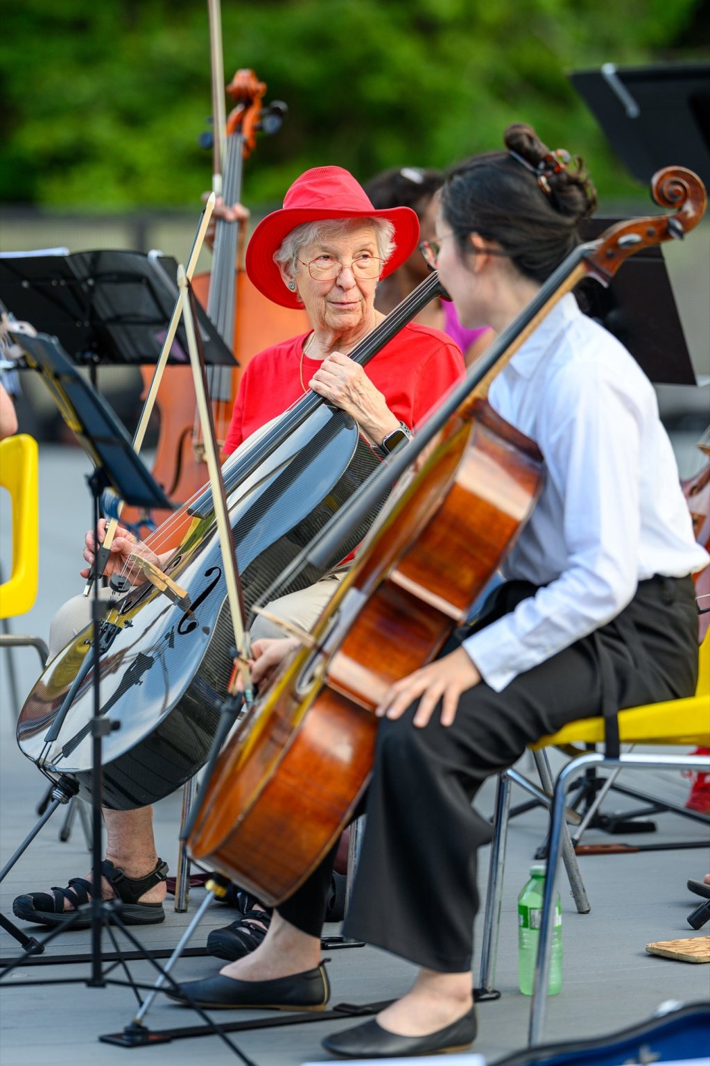 A cellist and violinist playing at Earl Bales Park