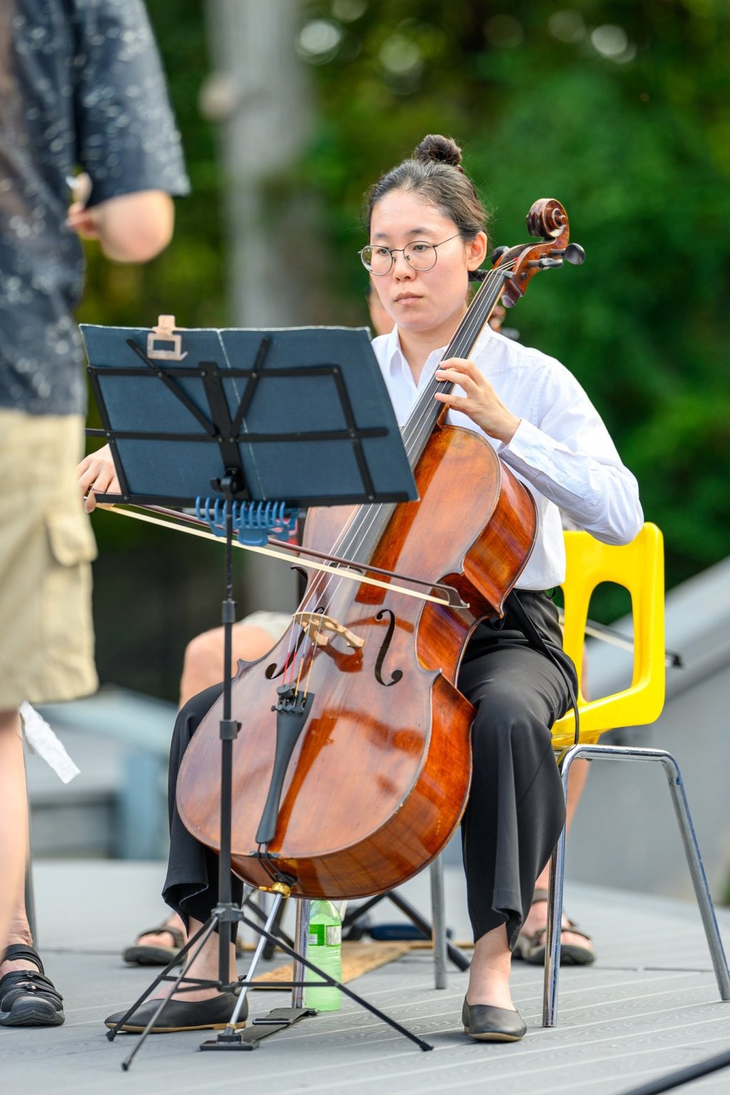 A cellist performing at Earl Bales Park
