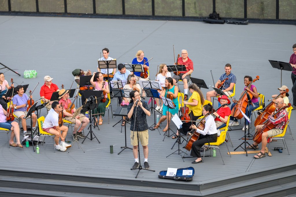 Players of all ages on the amphitheatre stage at Earl Bales Park